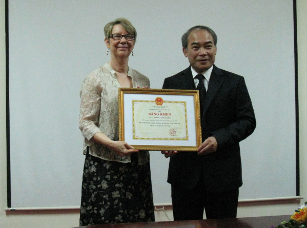 Diana was awarded a Bang khen from MOET in 2013. Shown with Vice Minister of Education Mr. Hien.